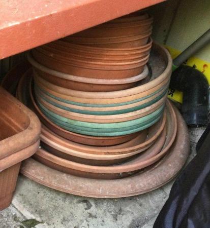 Image 1 of Assorted plant saucers for sale. Different sizes.