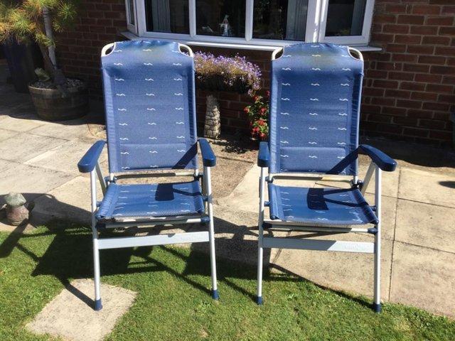 Preview of the first image of 2 x blue camping or garden chairs for sale.