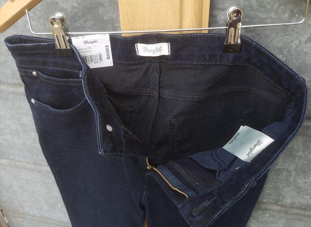 Preview of the first image of Wrangler women's slim fit jeans trousers.