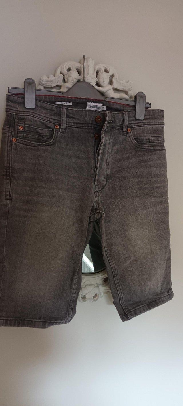 Preview of the first image of NEXT denim shorts. Size 30 regular fit, grey..
