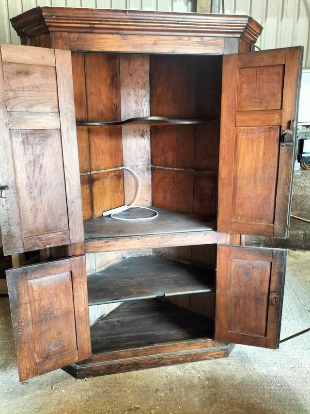 Preview of the first image of Large antique corner cupboard.