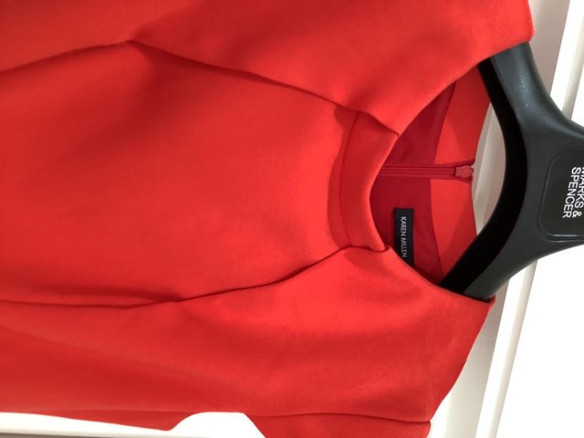 Preview of the first image of Bright red fitted Karen millen dress size 12.