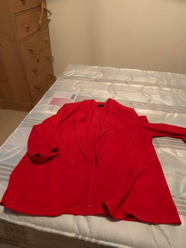 Preview of the first image of Marks and Spencer’s red jacket.
