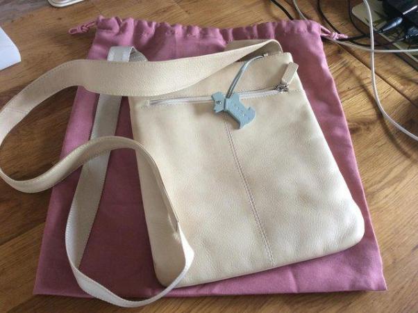 Image 2 of Radley cream messenger bag with pink dust bag.