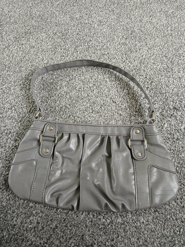 Preview of the first image of George Ladies grey handbag.