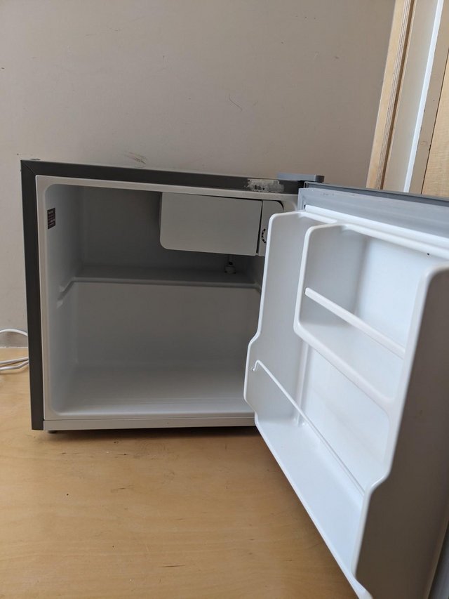 Preview of the first image of Mini Fridge (34L Russel Hobbs) in perfect condition.