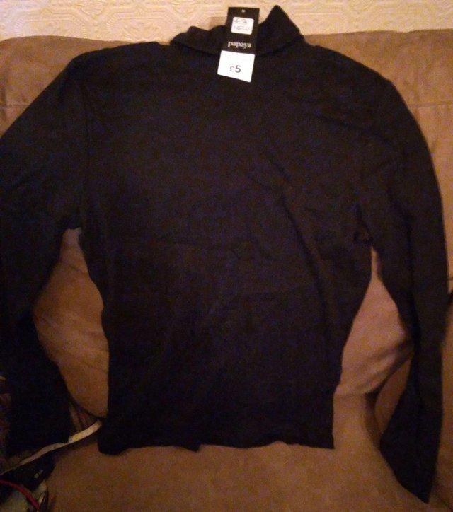 Preview of the first image of Women's Black Size 14 Long Sleeved Top (new).