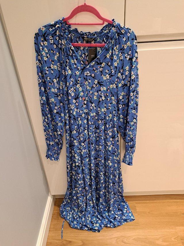 Preview of the first image of Ladies blue mix long sleeved dress size 14.