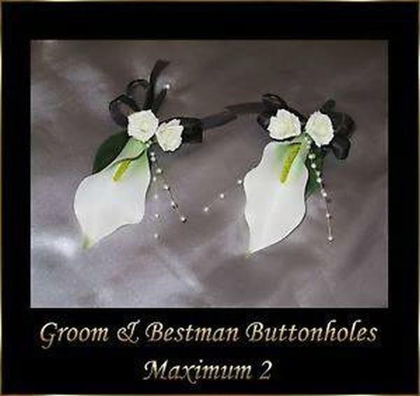 Preview of the first image of Lisa Groom & Best man Ivory With Black Ribbon button holes.