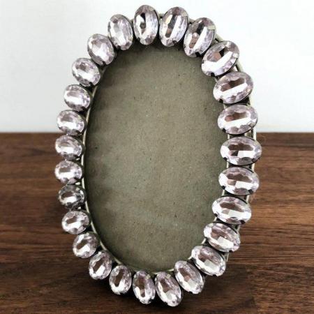 Image 1 of Standing oval photo frame with very pale pink gem surround.