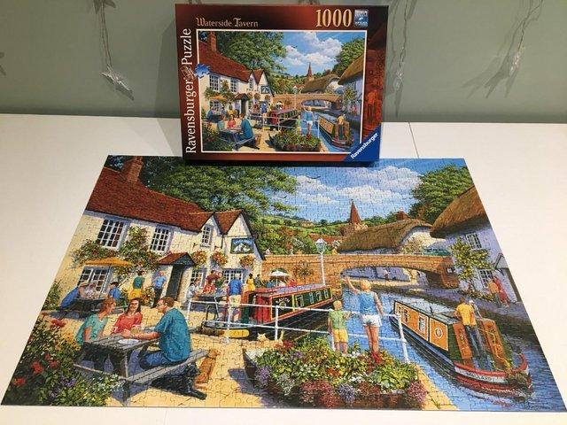 Preview of the first image of Ravensburger 1000 piece jigsaw titled Waterside Tavern..