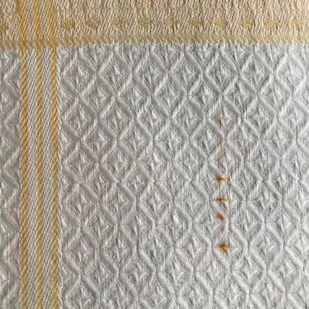 Image 3 of Vintage white & yellow patterned tablecloth. Approx 48" sq.