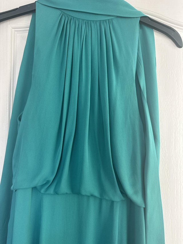 Preview of the first image of ladies reiss green dress.