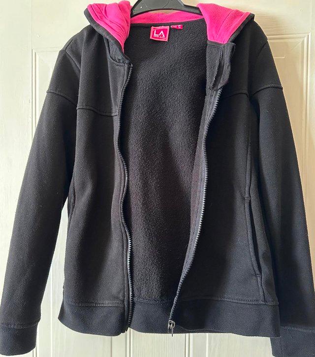 Preview of the first image of Children's LA Gear hoodie zipped top.