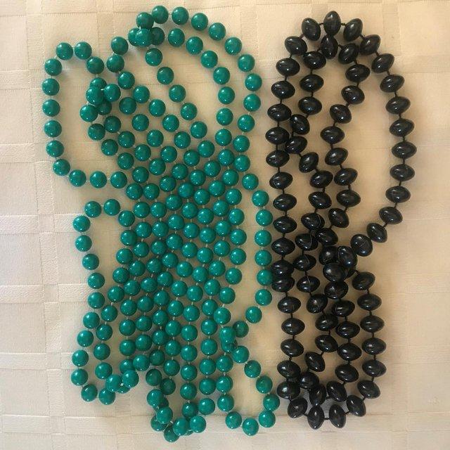 Preview of the first image of 2 bead necklaces, green (approx 64"), black (approx 28").