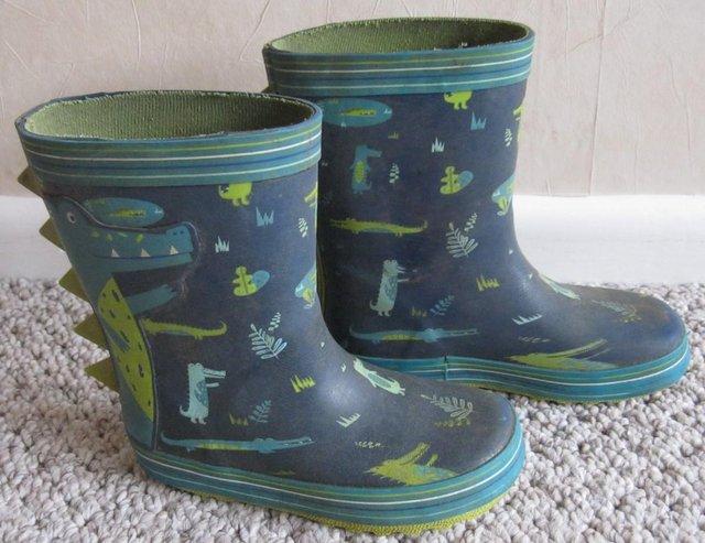 Preview of the first image of Boys slippers and wellies, sizes 9 and10.
