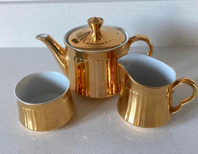 Preview of the first image of ROYAL WORCESTER PORCELAIN TEA POT SET..
