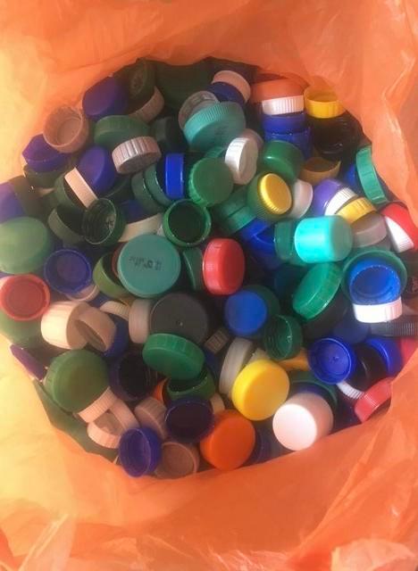 Preview of the first image of LARGE BAG 100’s COLOURED BOTTLE TOPS.