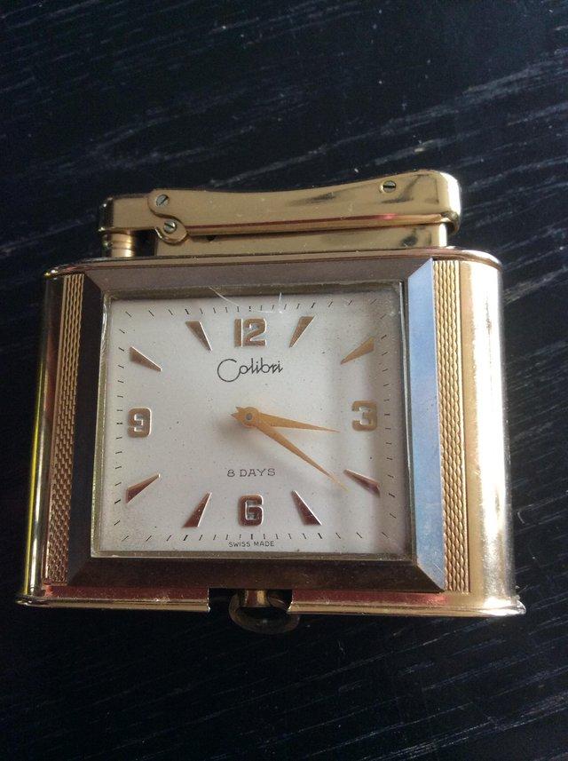 Preview of the first image of Colibri monopoly clock/ table lighter pre 1970.