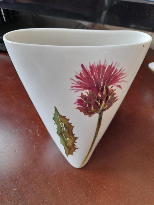 Preview of the first image of Beautiful thistle vase unusual design.