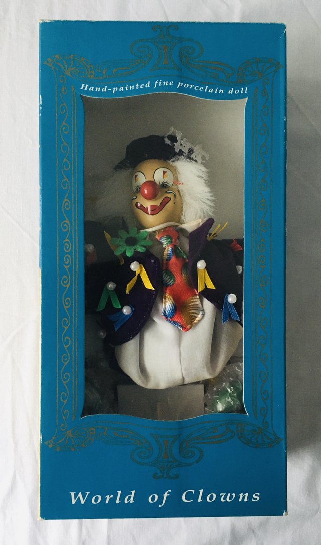 Preview of the first image of World of Clowns. Hand painted fine porcelain doll.