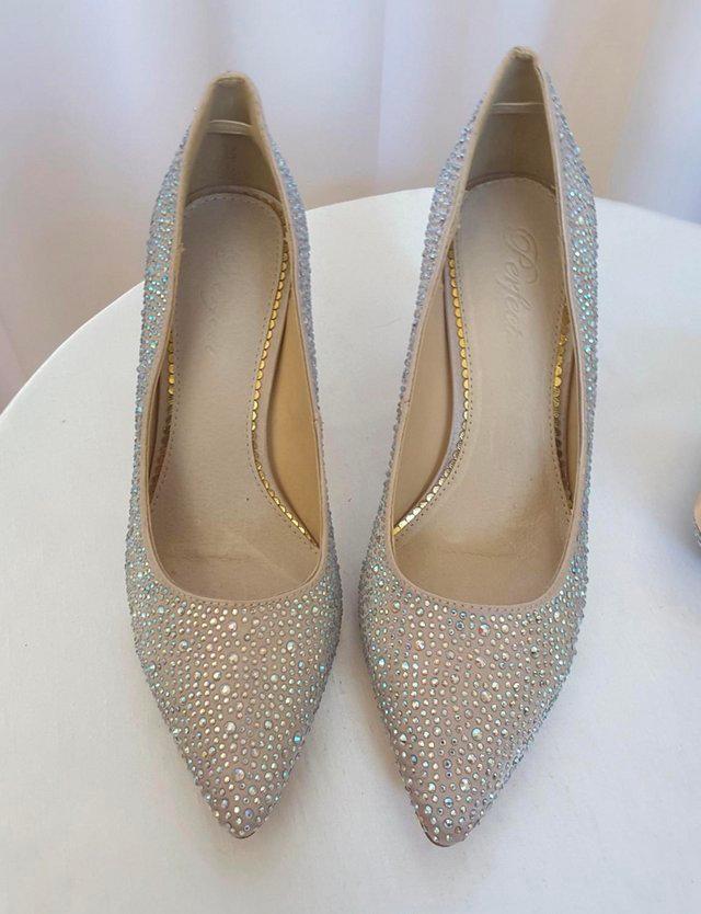 Preview of the first image of Classic nude crystal encrusted pointed court shoe. New in bo.