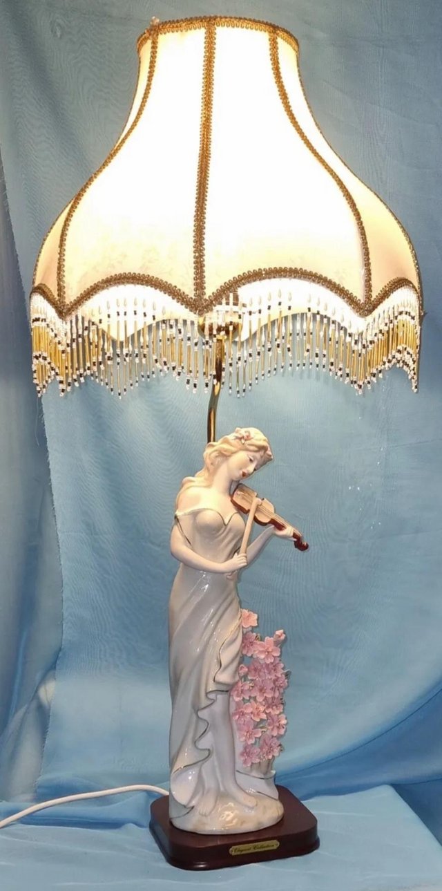 Preview of the first image of Elegant Collection Figural Porcelain Lamp With Beaded Shade.
