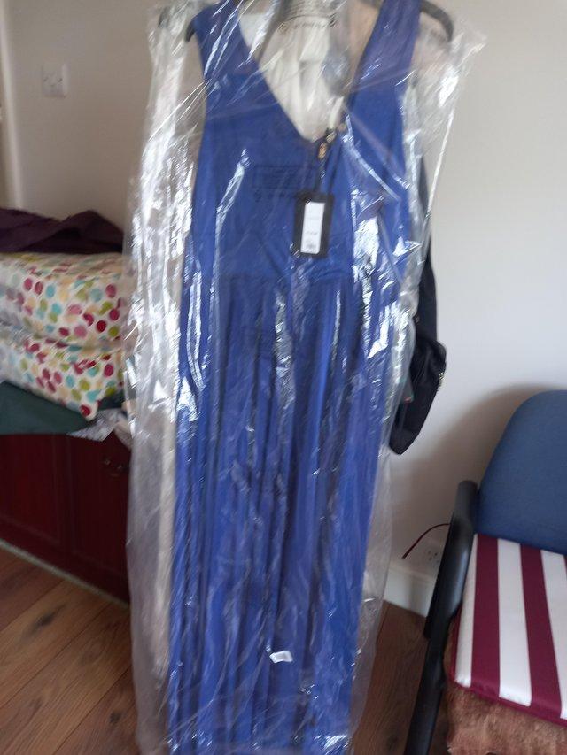 Preview of the first image of Long Royal blue dress brand new size 14.