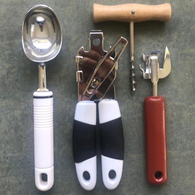 Preview of the first image of 4 kitchen utensils: 2 tin openers,ice cream scoop,cork screw.