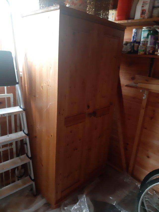 Preview of the first image of NEW ANTIQUE PINE SOLID WARDROBE EXCELLENT CONDITION.
