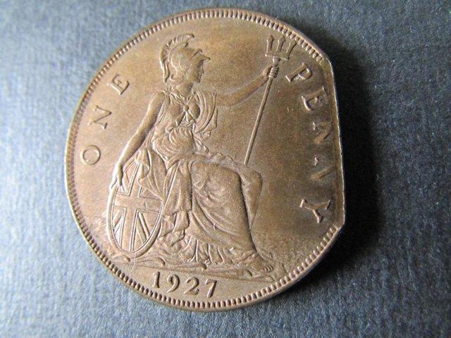 Preview of the first image of 1927 GEORGE V ONE PENNY WITH PART OF SIDE MISSING..