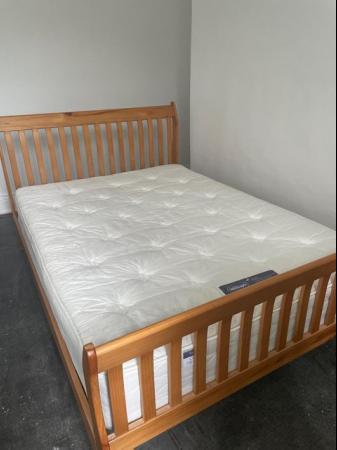 Image 1 of double bed with wood frame includes mattress