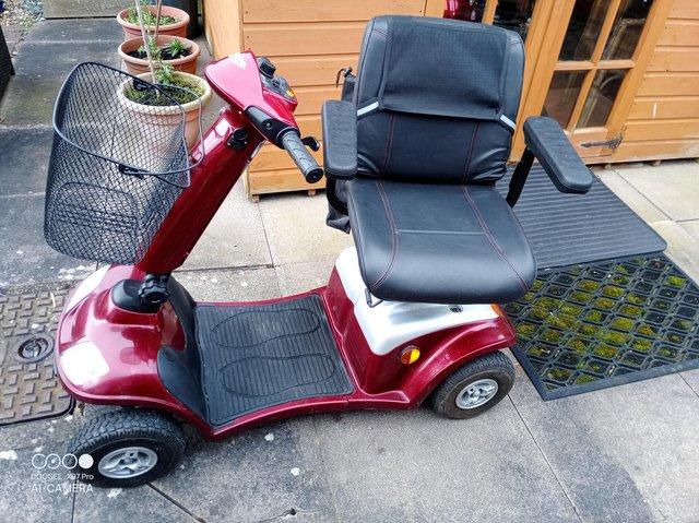 Preview of the first image of Midrange mobility scooter for sale in good condition with co.