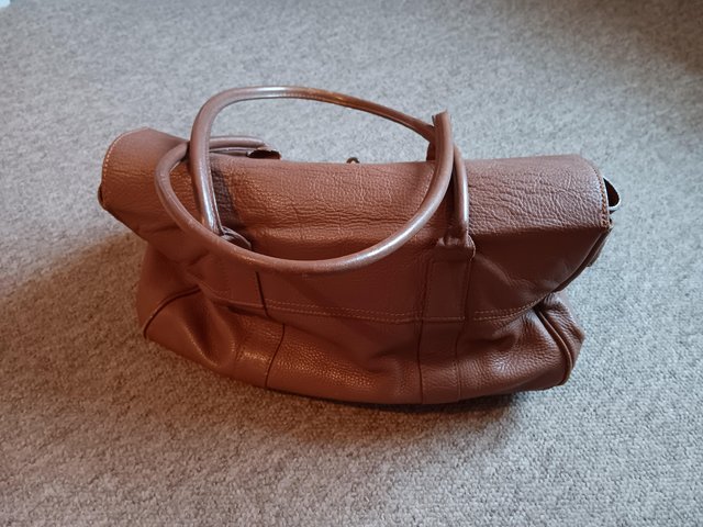 Preview of the first image of Tan leather tote/shoulder bag.