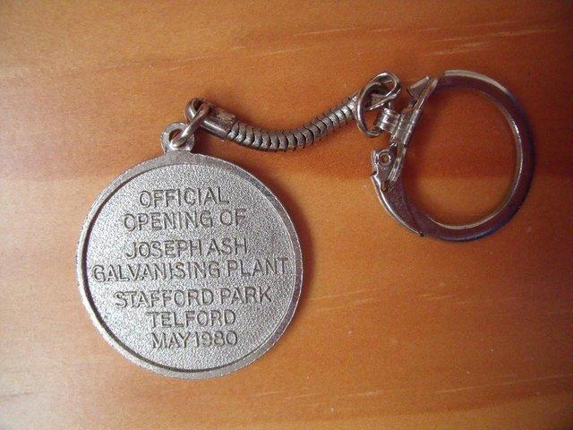 Preview of the first image of Official opening Joseph Ash Telford May 1980 key fob, ring..