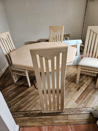 Image 2 of Extendable dining table and four chairs.