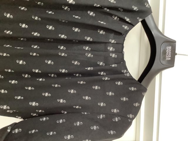 Preview of the first image of Black jumpsuit with white print size 12 from Great Plains.