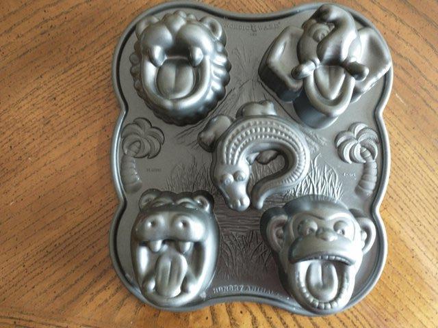 Preview of the first image of Wild animals cake and ice cream mould. Heavy metal.