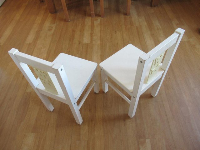 IKEA Two "Kritter" white wood child chairs. — photo 2 of 3