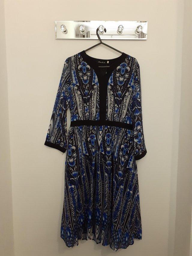 Preview of the first image of Reduced!-Beautiful dress- Black, blue and white Floral- BNWT.