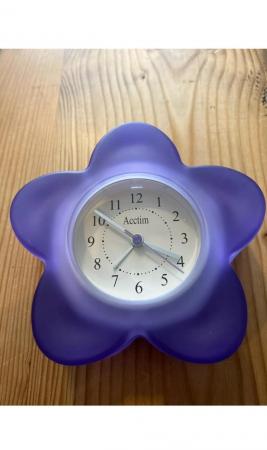 Image 1 of Purple bedside alarm clock.