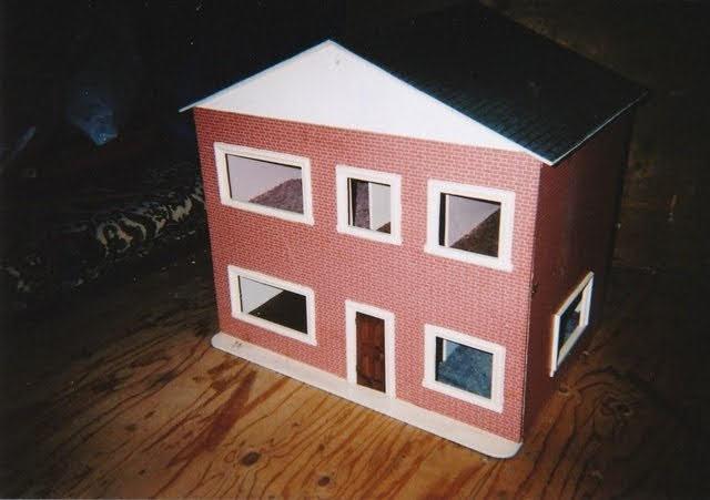 Preview of the first image of Made by hand wooden dolls house.