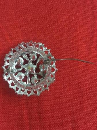 Image 2 of Pretty vintage silvertone and clear stones circular brooch.