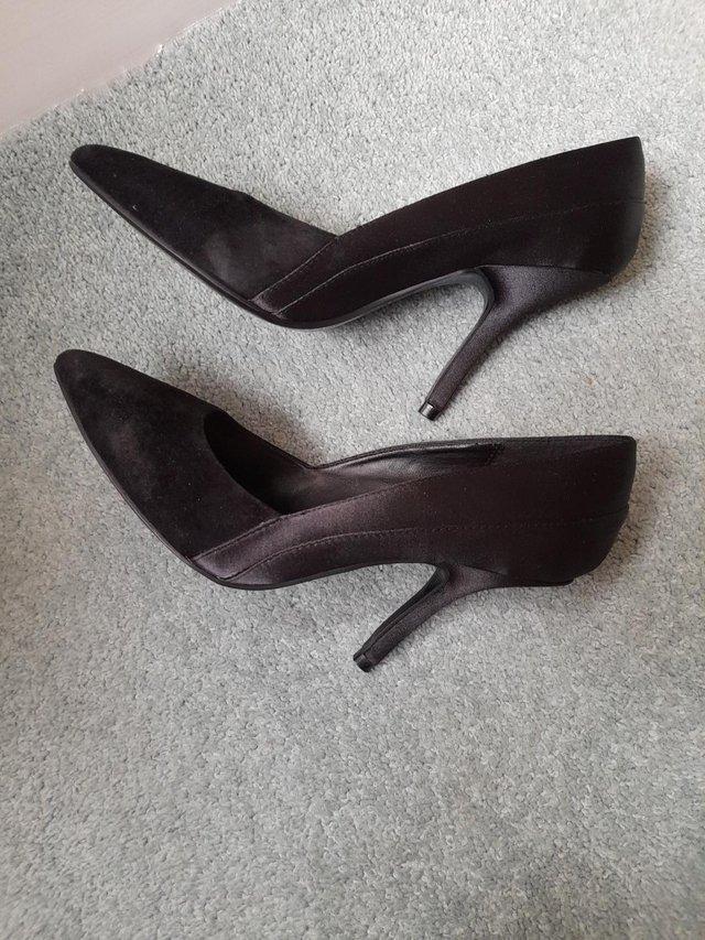 Preview of the first image of Jasper Conran ladies black shoes.
