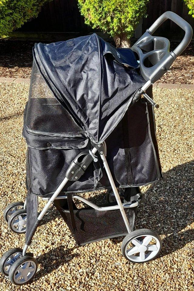 Preview of the first image of Excellent condition - Black Pet stroller for dogs of cats.