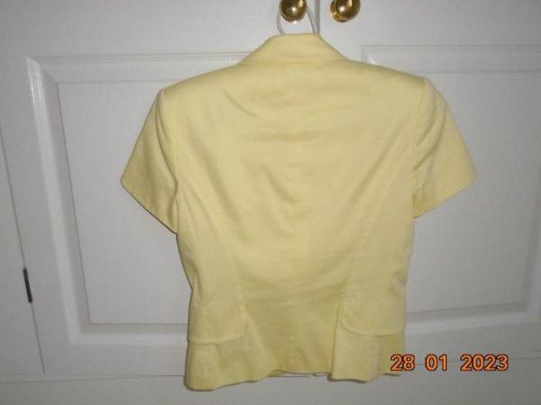 Image 2 of Pale yellow short sleeved fitted cotton jacket