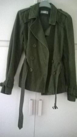 Image 1 of green belted jacket button fastening