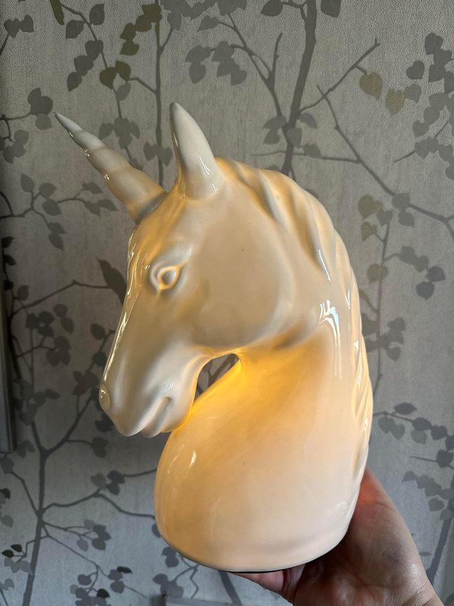 Preview of the first image of A White ceramic Unicorn Lamp..