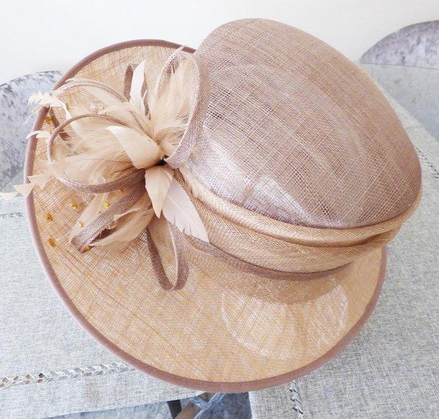 Preview of the first image of AS NEW DESIGNER HAT TO MATCH WEDDING OUTFIT.