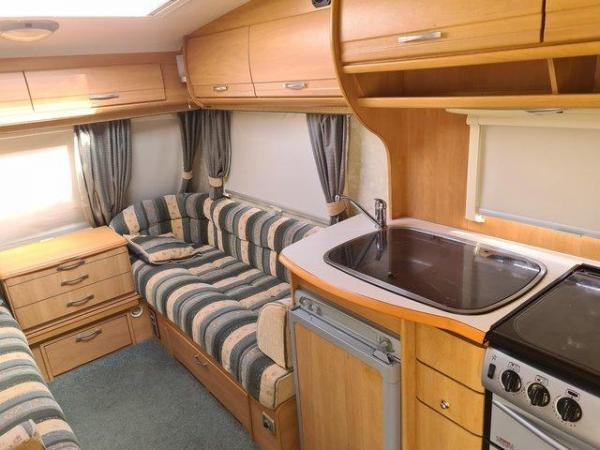 Image 2 of Swift Archway Woodford touring caravan with motor mover